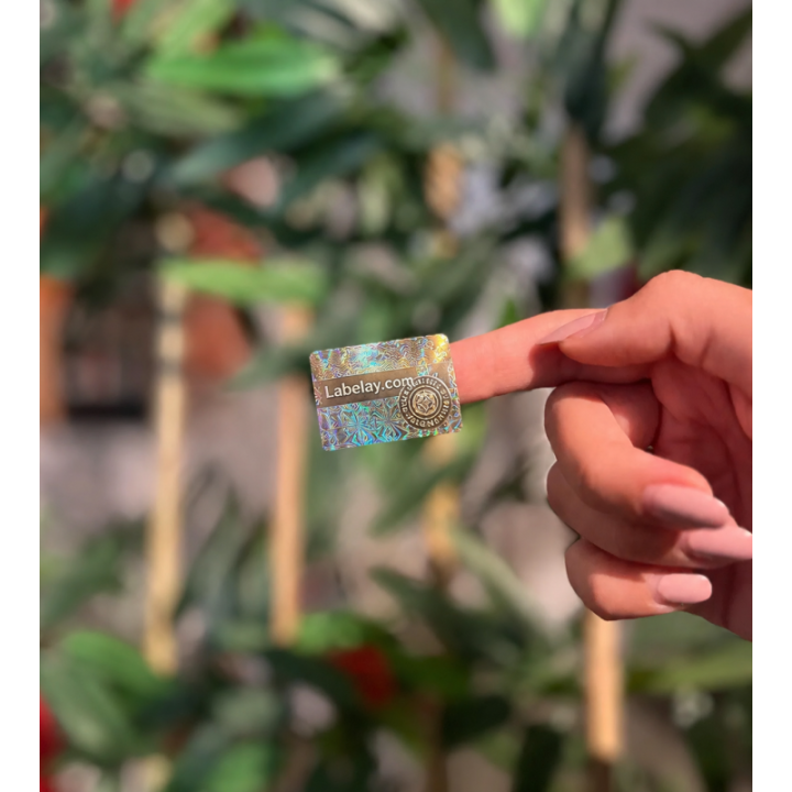 Custom holographic label applied to premium product packaging